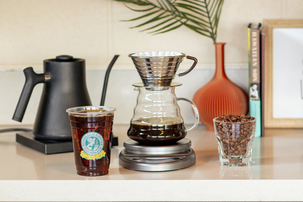 Iced Kalita and brewing supplies on a kitchen counter