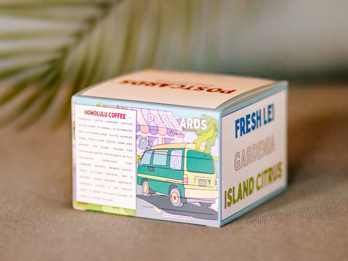 
                  
                    Back of custom Honolulu Coffee candle by Postcards, including featured Sue Brew Van in the back.
                  
                