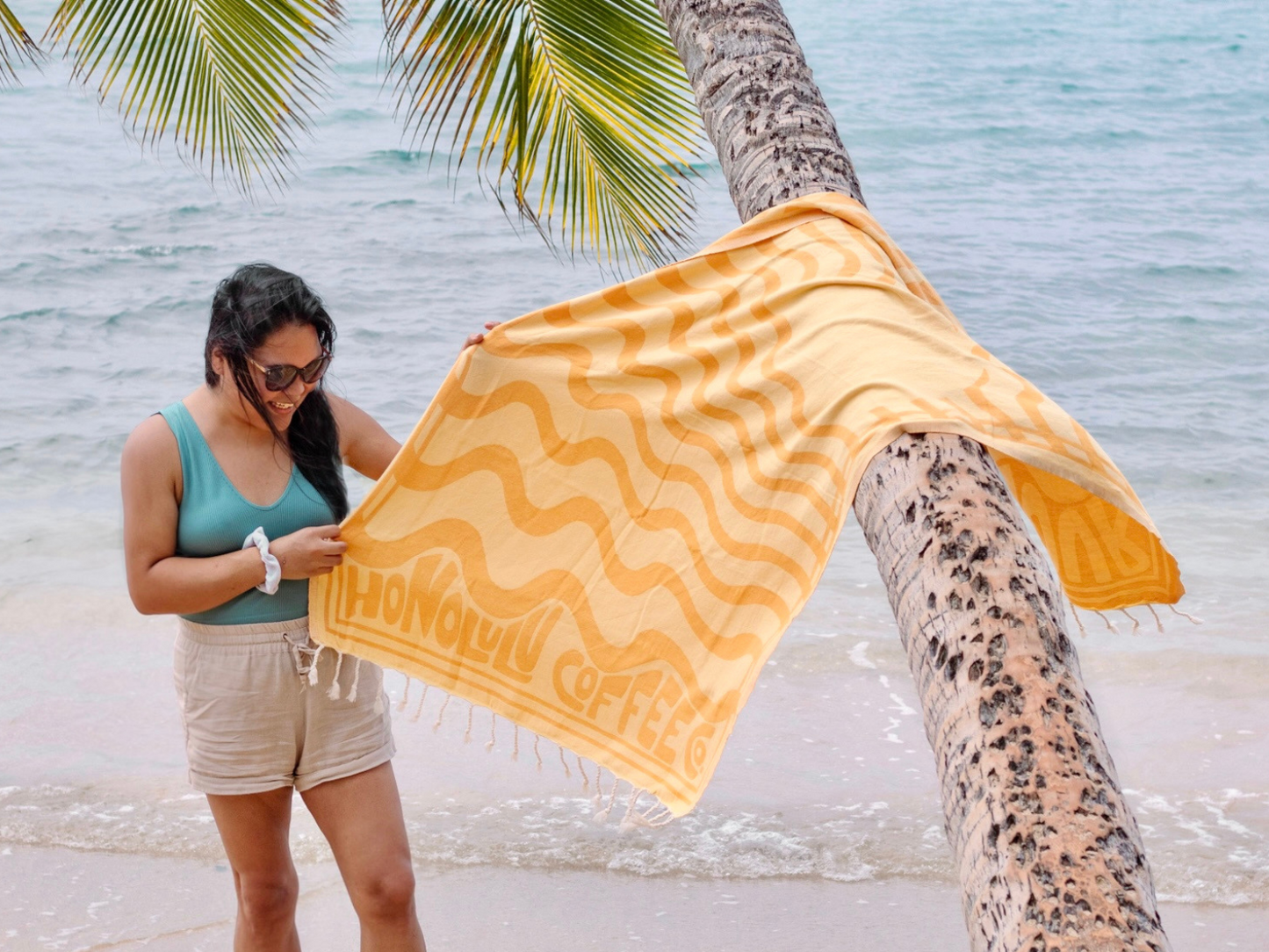 Fixing the Golden Hour Towel at the beach