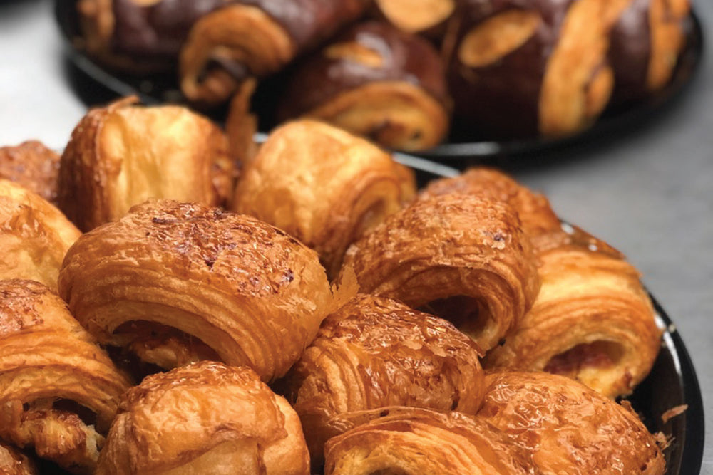 A stack of our famous Croissants from our Honolulu Hawaii coffee shops and cafes