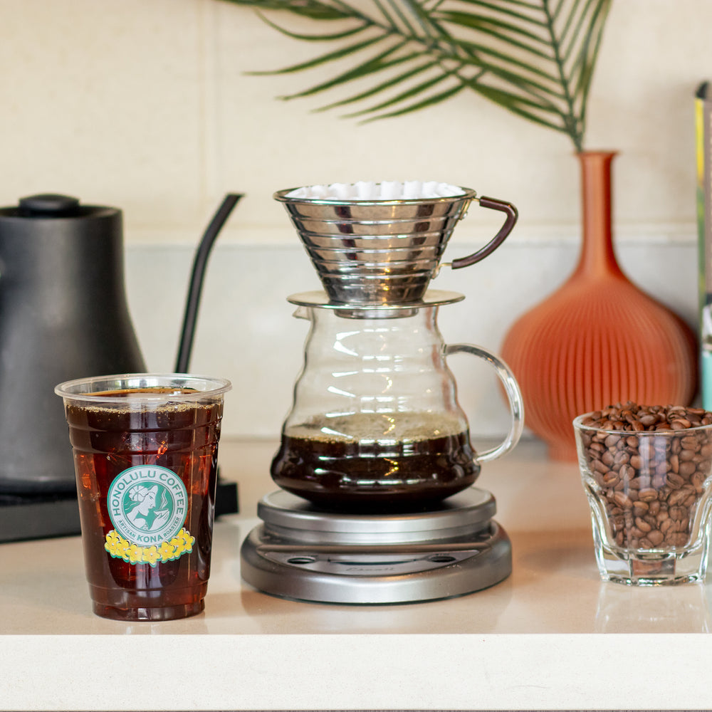 Iced Kalita and brewing supplies on a kitchen counter