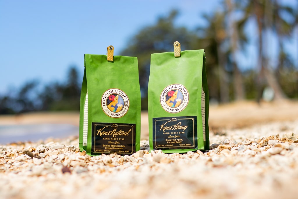 2 bags of Kona coffee on the beach