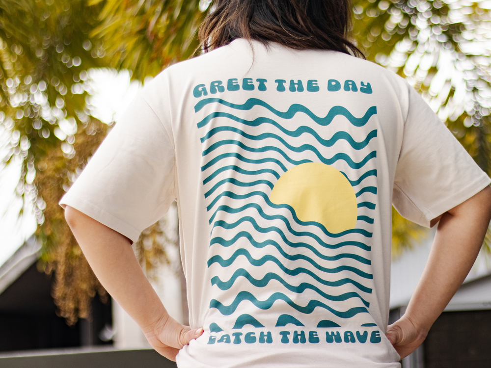 
                  
                    Greet the Day Tee
                  
                